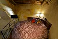 Premium Deluxe Cave Room  Golden Apple Cappadocia Cave Hotel Honeymoon Room Bed